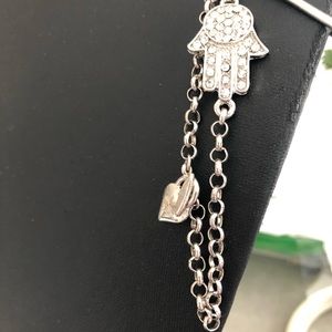 Fatima hand with purchase